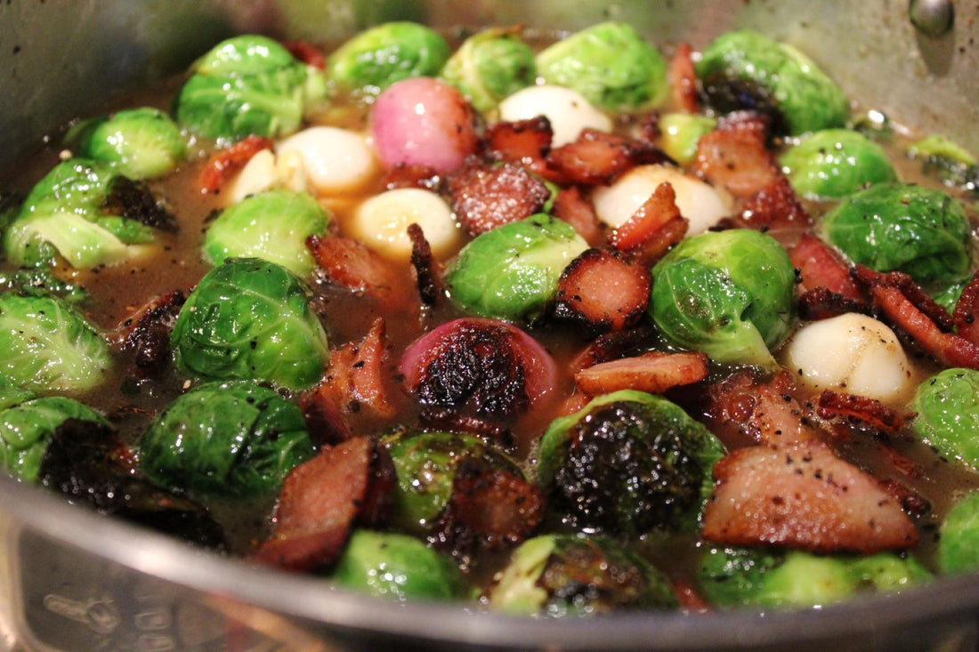 Pan cooking vegetables and bacon